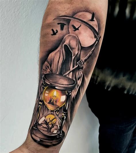 tattoos grim reaper|grim reaper with hourglass tattoo.